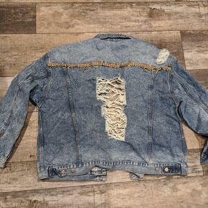 Distressed jean jacket
